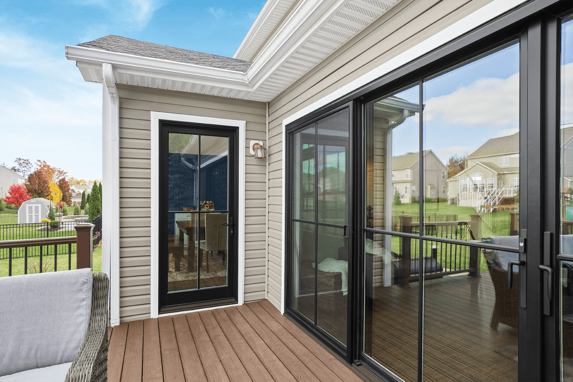 View of a black Infinity Inswing French door from outside on a deck.