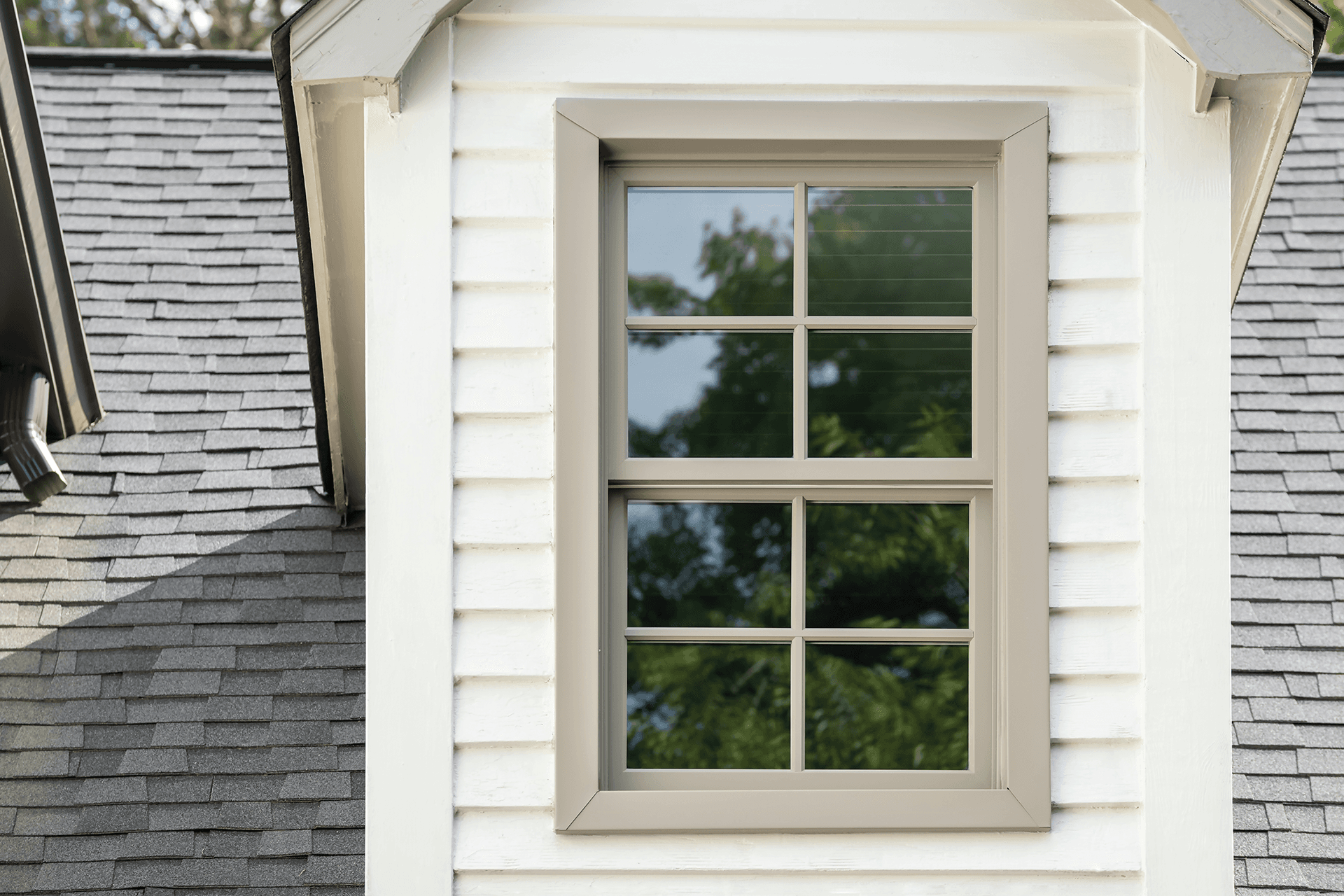 Exterior view of a double hung dormer window.