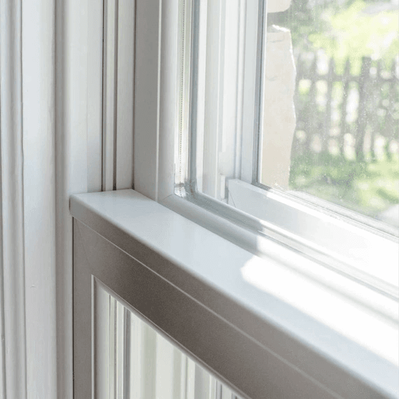 Close up view of a double hung window check rail