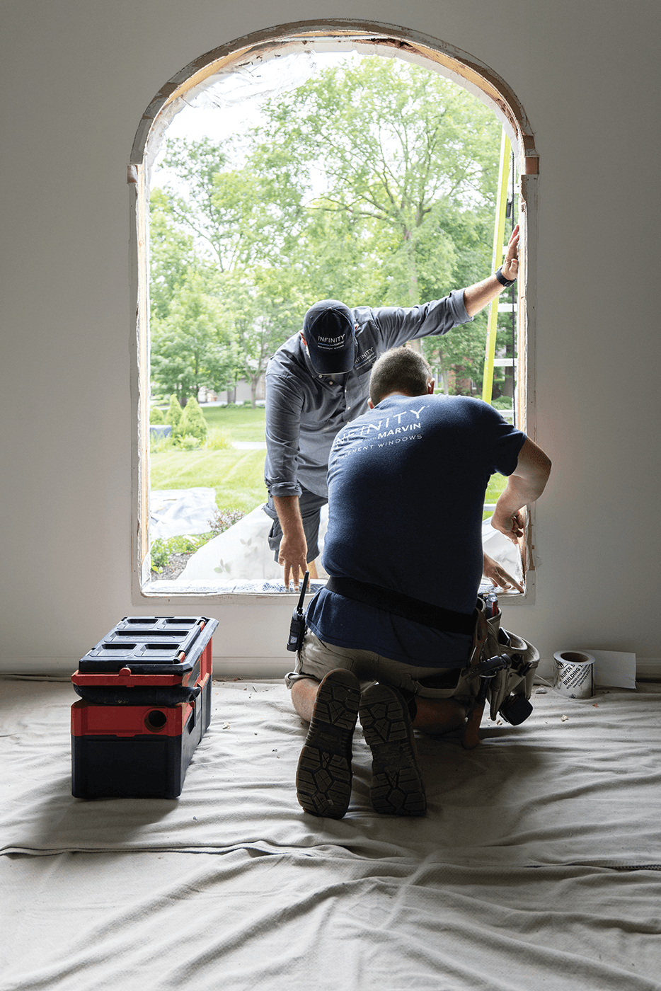 Window installers prepare a window rough opening before placing a window.